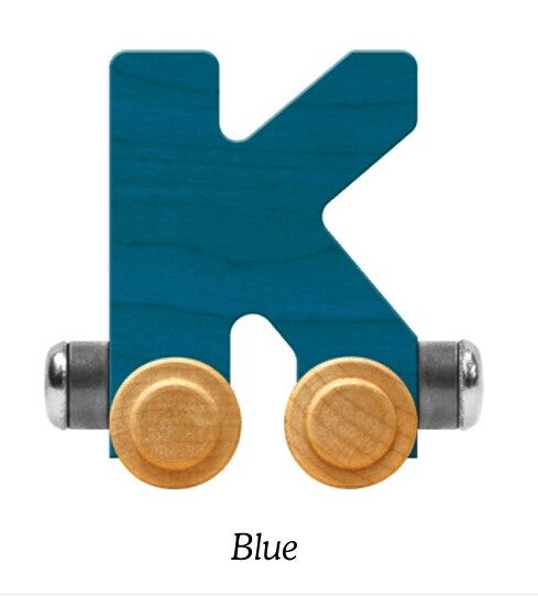 A wooden letter K toy train car in a medium blue finish with two round gold-toned wheels and silver metal axles, shown on a white background with the word 'Blue' underneath.