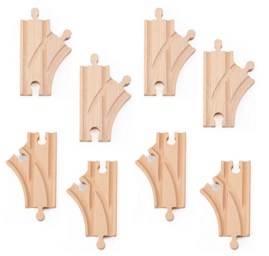 Set of eight wooden train track pieces on a white background