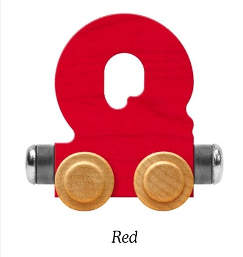 A red wooden Q toy train connector piece with two round natural wood wheels and silver metal ends, shown on a white background with the word 'Red' below.