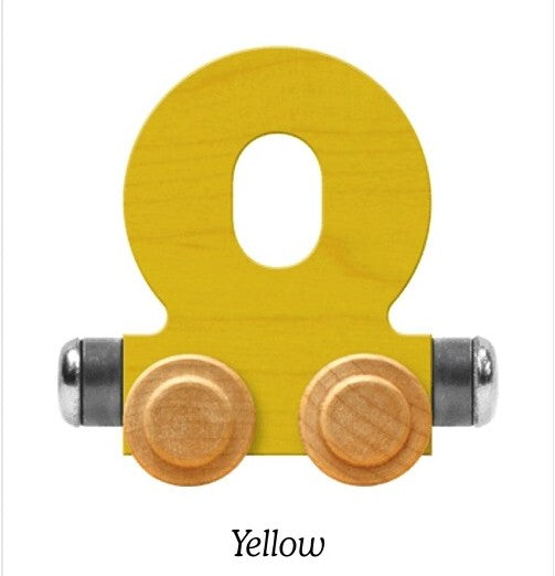 A yellow wooden letter O toy train wheel with two natural wood wheels and silver metal axles, shown on a white background with the word 'Yellow' underneath.